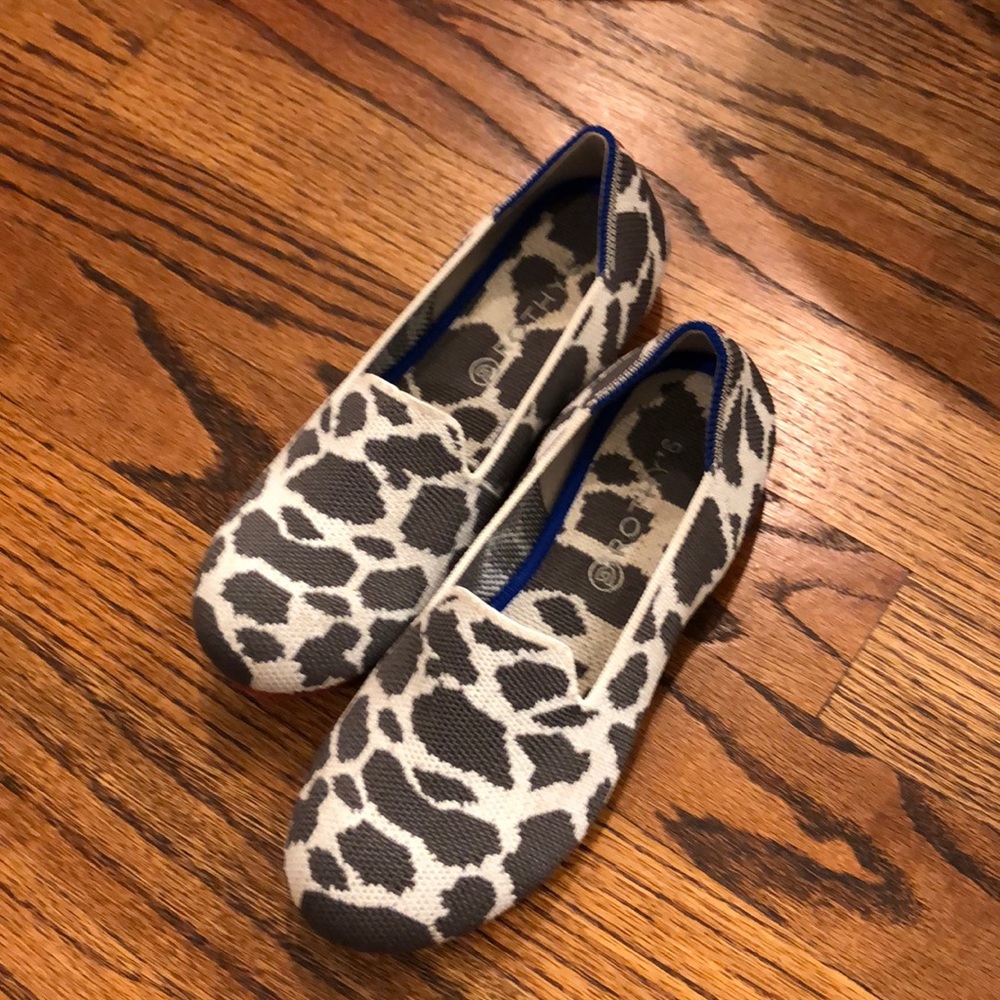 Girl’s cow print Rothy’s flats size 2